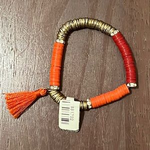 FLAT DISK BEADS make up this STUNNING stretchy BRACELET- orange - red - gold